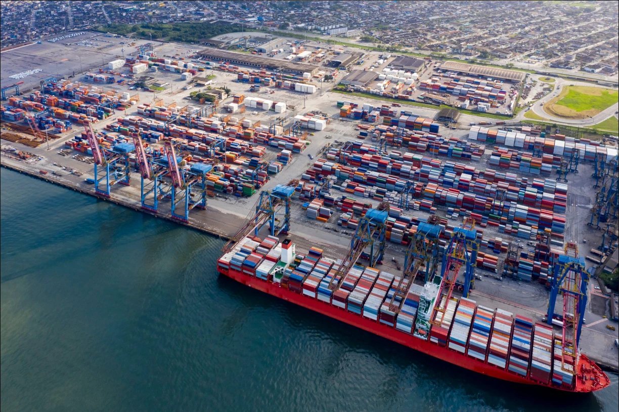 Aerial view of a container port with a ship being loaded